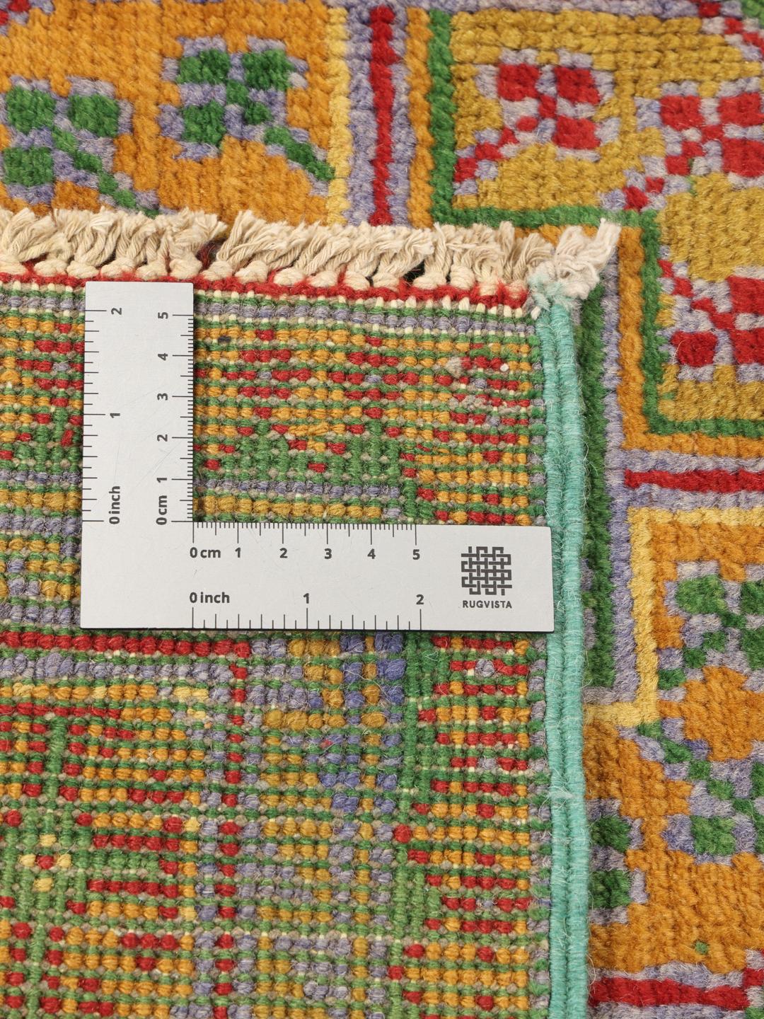 Tapis Afghan Akhche noué à la main avec un champ vert et des médaillons géométriques