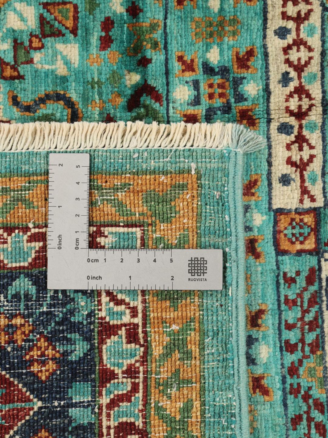 Handgeknoopt Mamluk-tapijt uit Afghanistan met een groenblauw veld en ingewikkelde geometrische patronen.