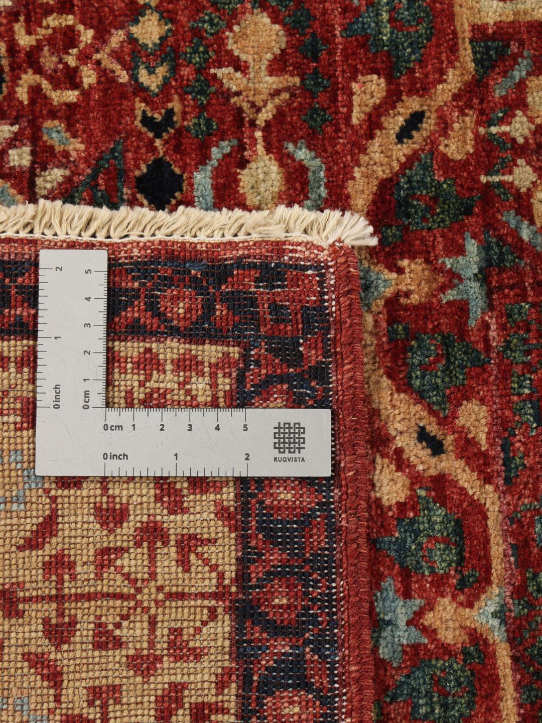 Et håndknyttet afghansk Mamluk-tæppe med et dybrødt og beige geometrisk mønster.