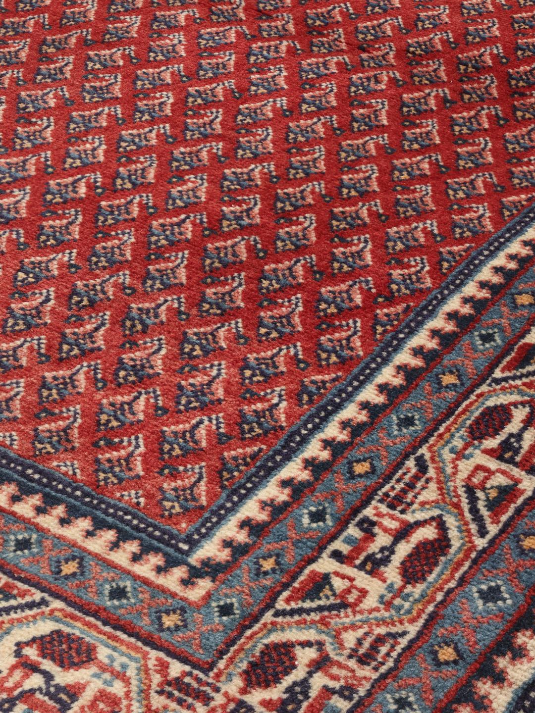 Hand-knotted Sarough Mir rug with an intricate red pattern from the Middle East