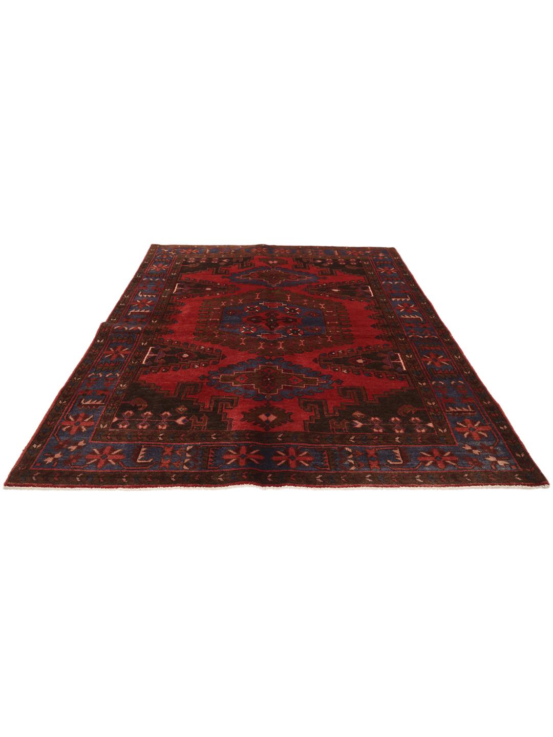 Handgeknoopt Wiss-tapijt met een traditioneel rood en blauw geometrisch patroon