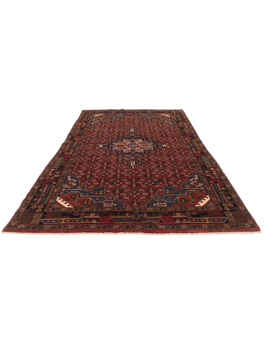Hand-knotted Hosseinabad rug with a central medallion in red and blue tones