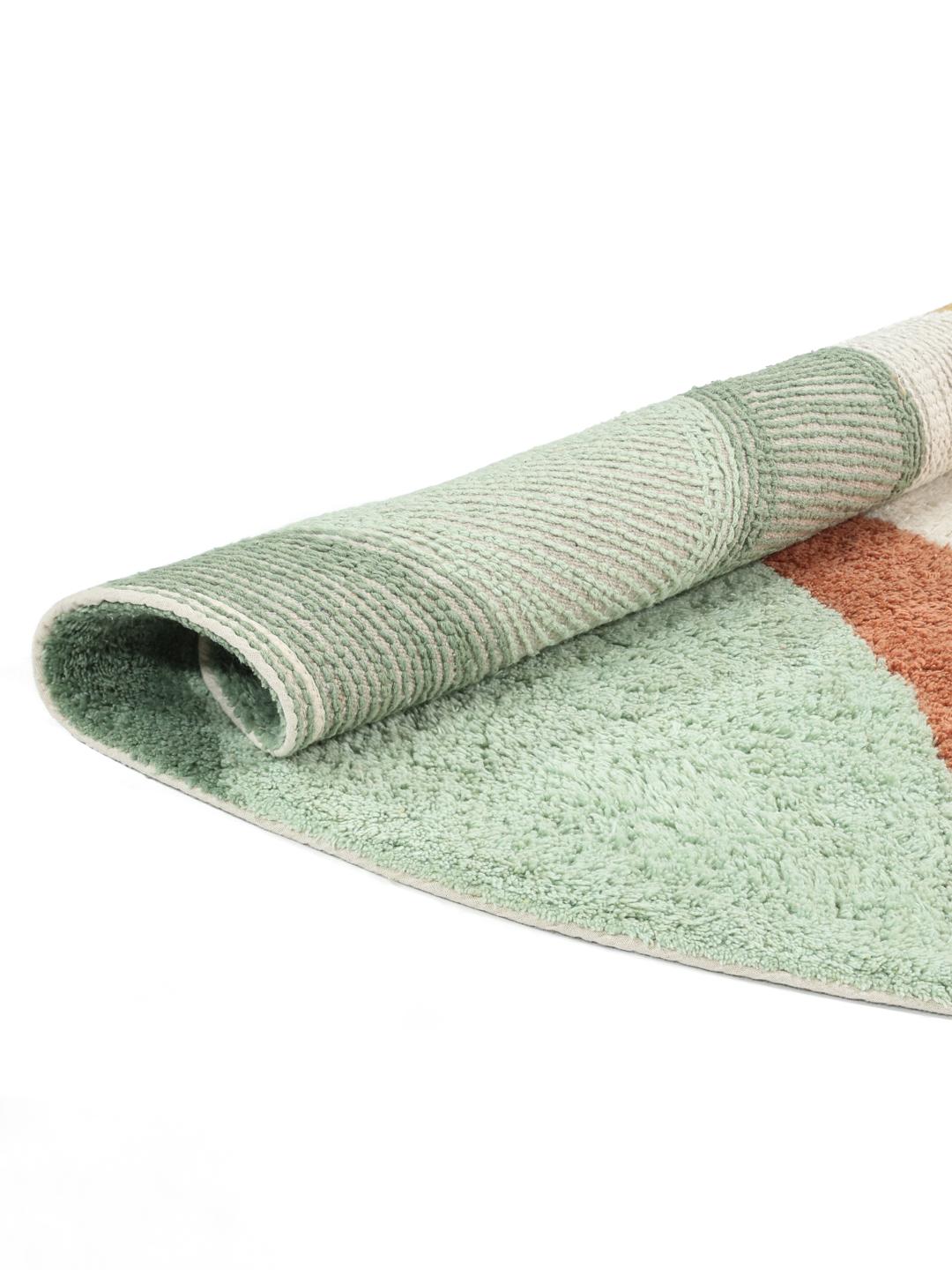 Tapis de bain rond multicolore aux formes organiques