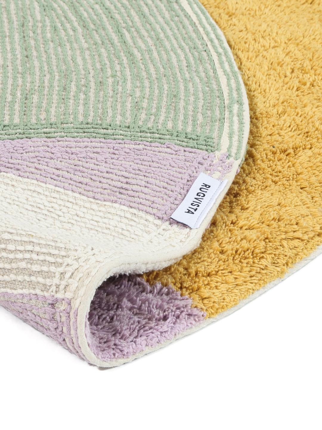 Tapis de bain rond multicolore aux formes organiques