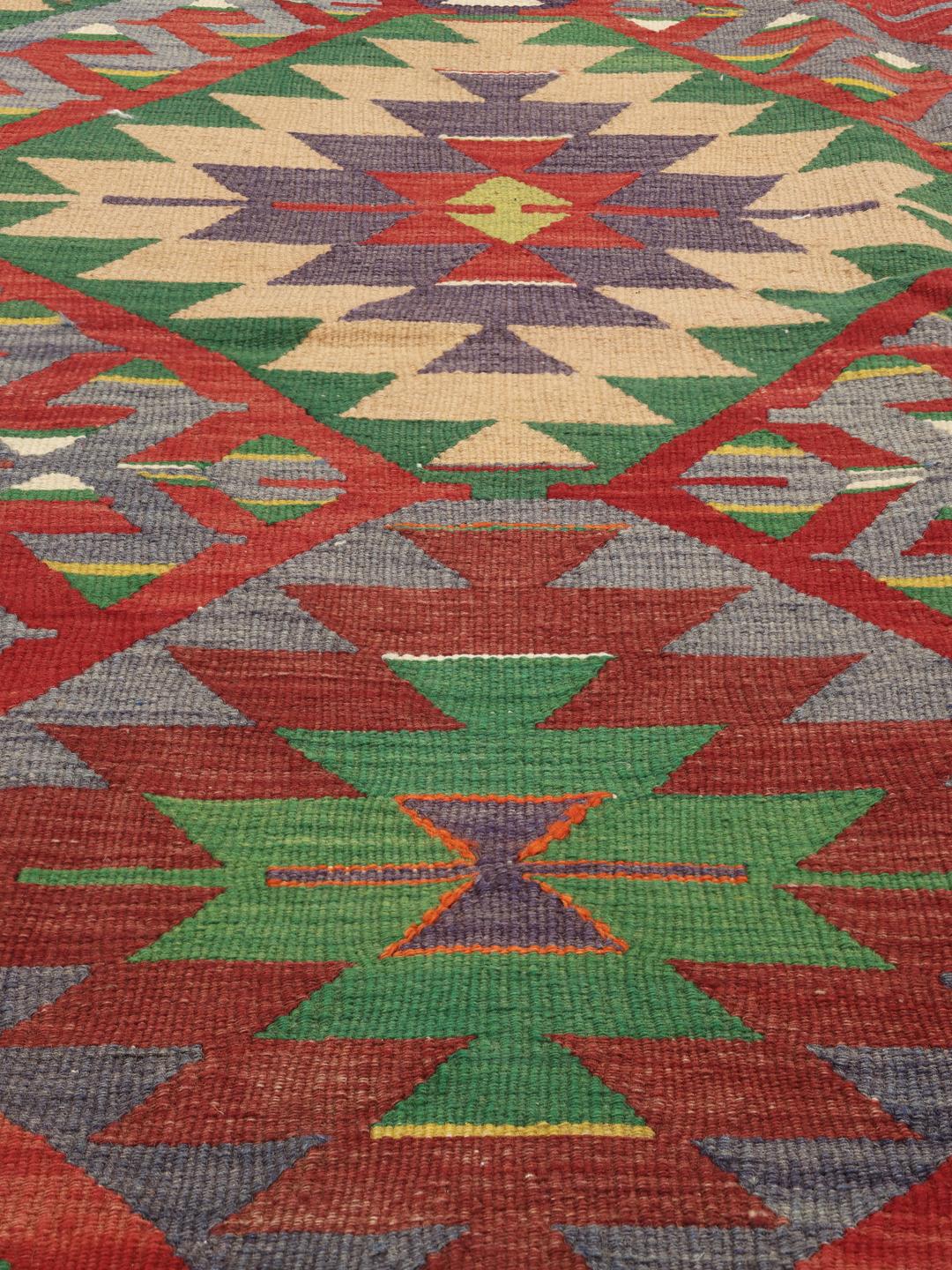 Tapis Kilim turc vintage avec des motifs géométriques en losange en laine multicolore
