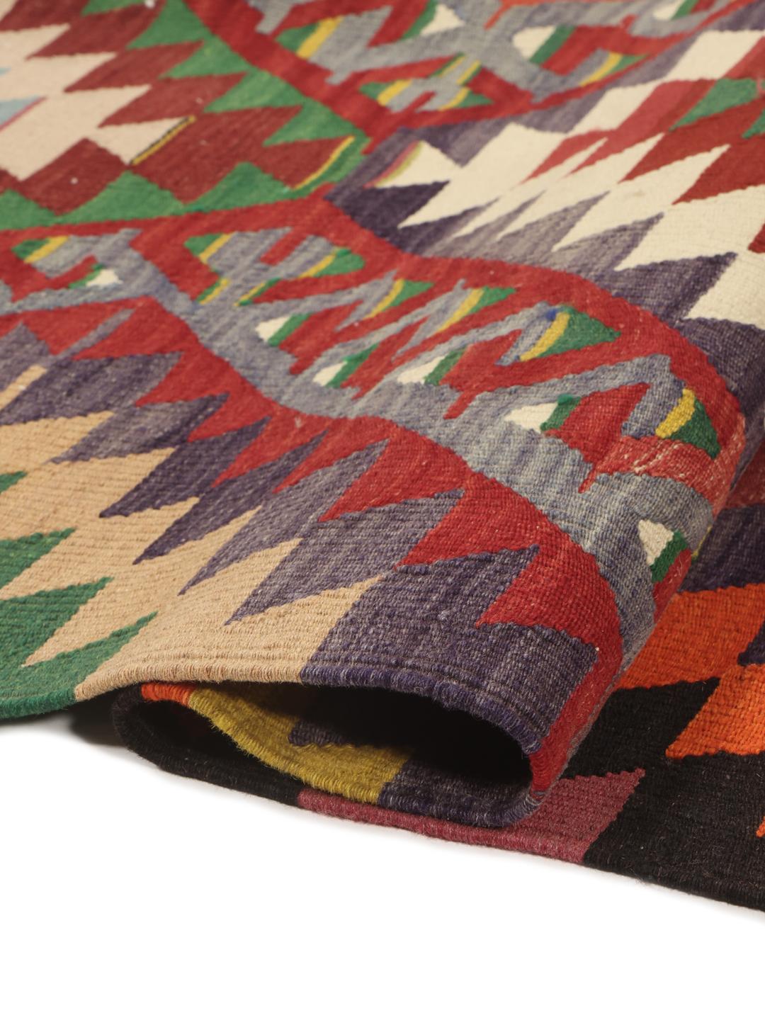 Tapis Kilim turc vintage avec des motifs géométriques en losange en laine multicolore