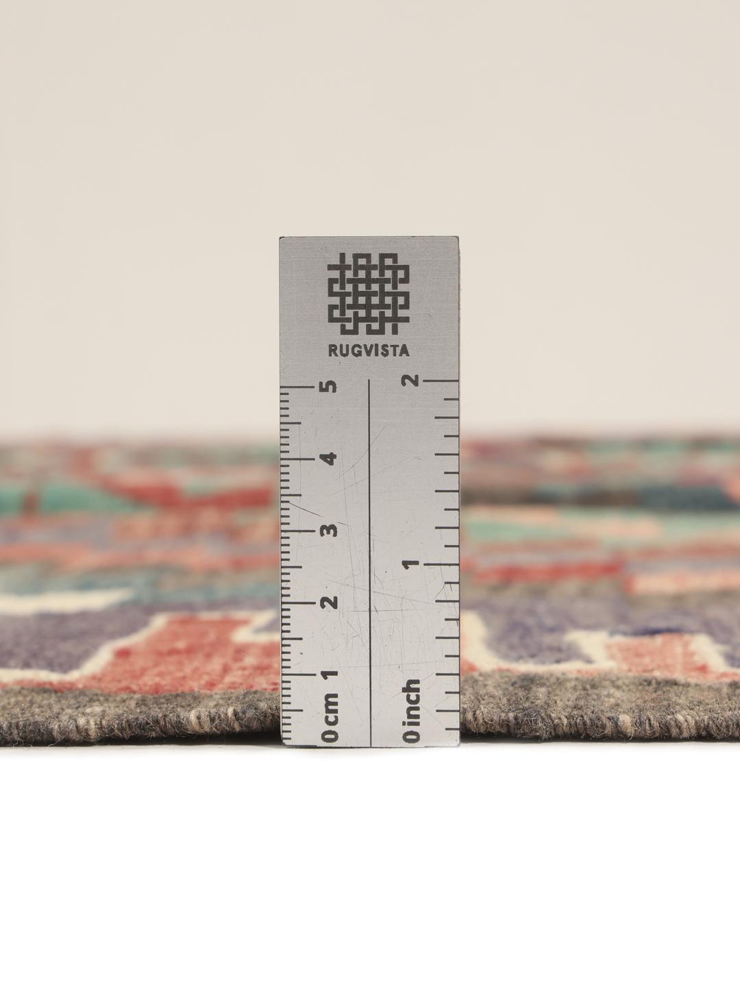 Ręcznie tkany zabytkowy dywan kilim z Turcji w czerwono-turkusowe geometryczne wzory
