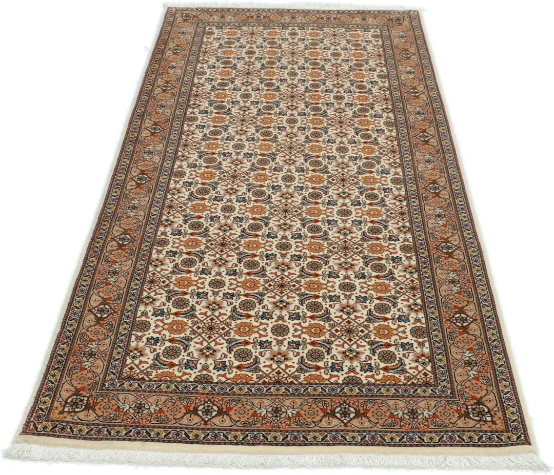 Håndknyttet Tabriz løber med indviklede blomstermønstre i beige og dæmpede røde toner fra Mellemøsten