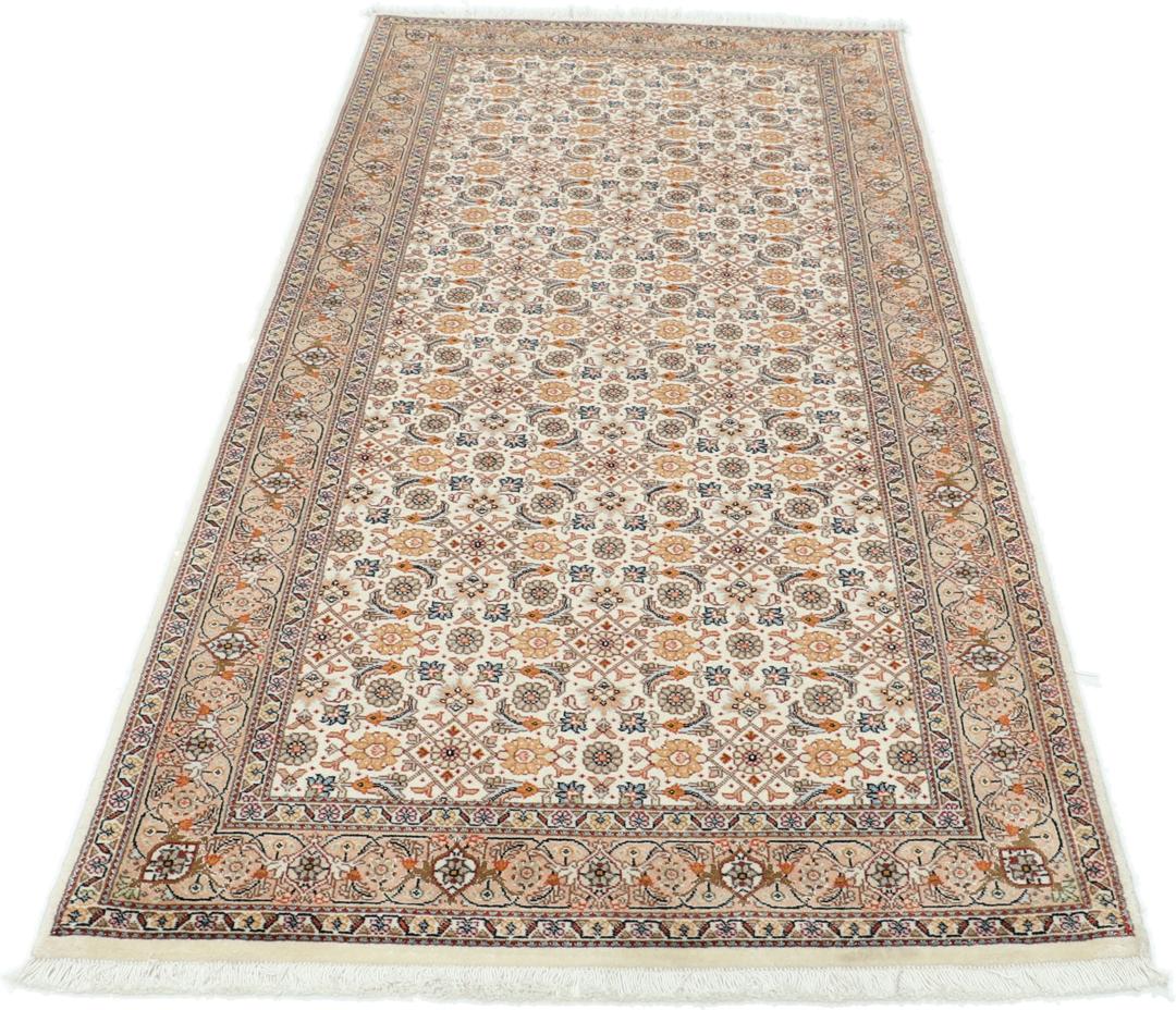 Håndknyttet Tabriz løber med indviklede blomstermønstre i beige og dæmpede røde toner fra Mellemøsten