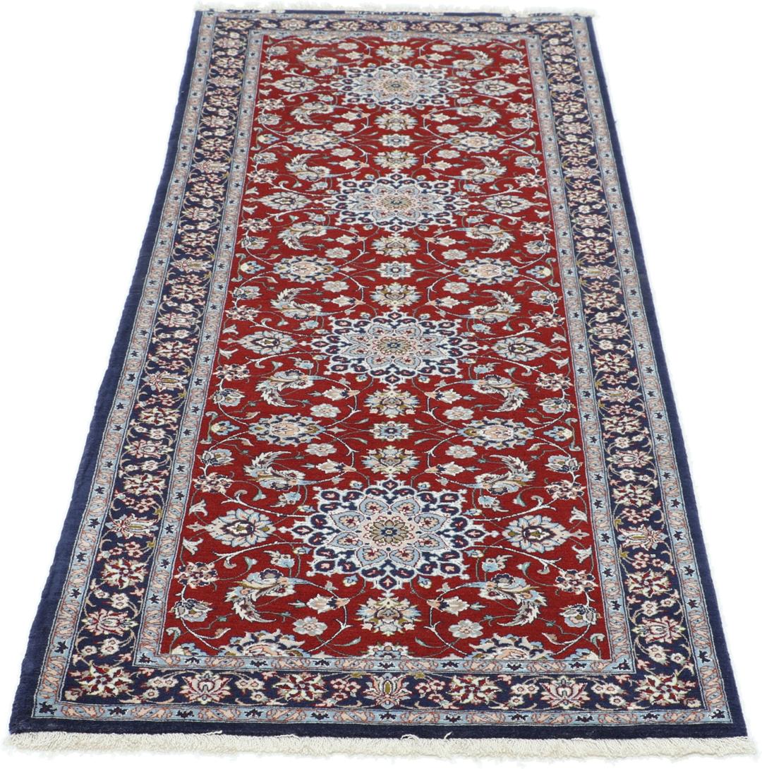 Handgeknoopte Isfahan loper met gedetailleerde bloempatronen in donkerrood en blauw