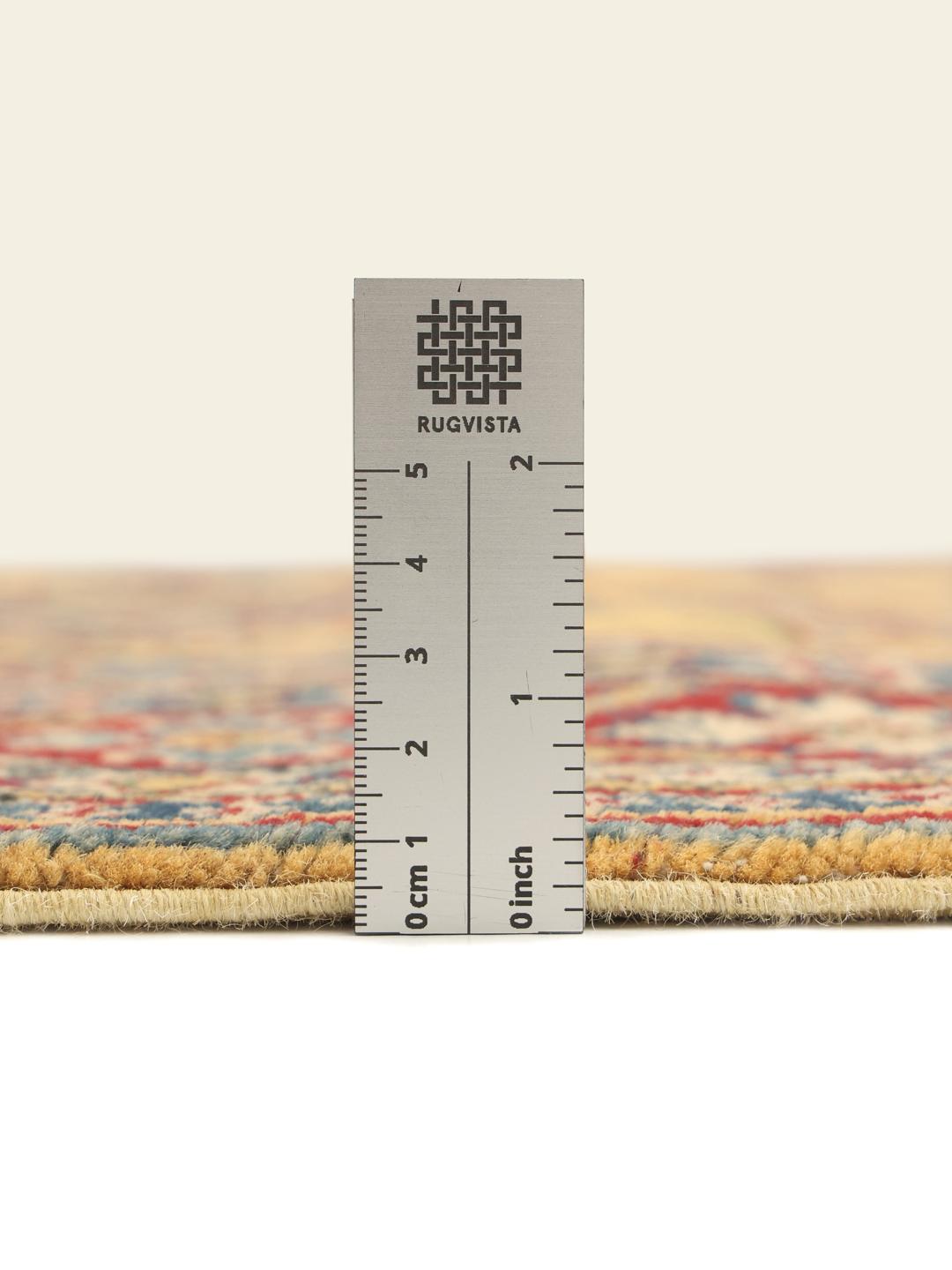 Handgeknüpfter Kazak-Teppich aus Afghanistan mit geometrischen Mustern in Gelb, Rot und Blau.