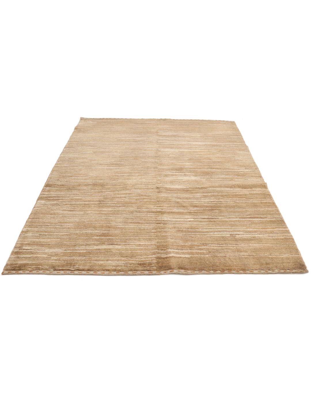 Håndknyttet Gabbeh-tæppe fra Mellemøsten i beige nuancer.