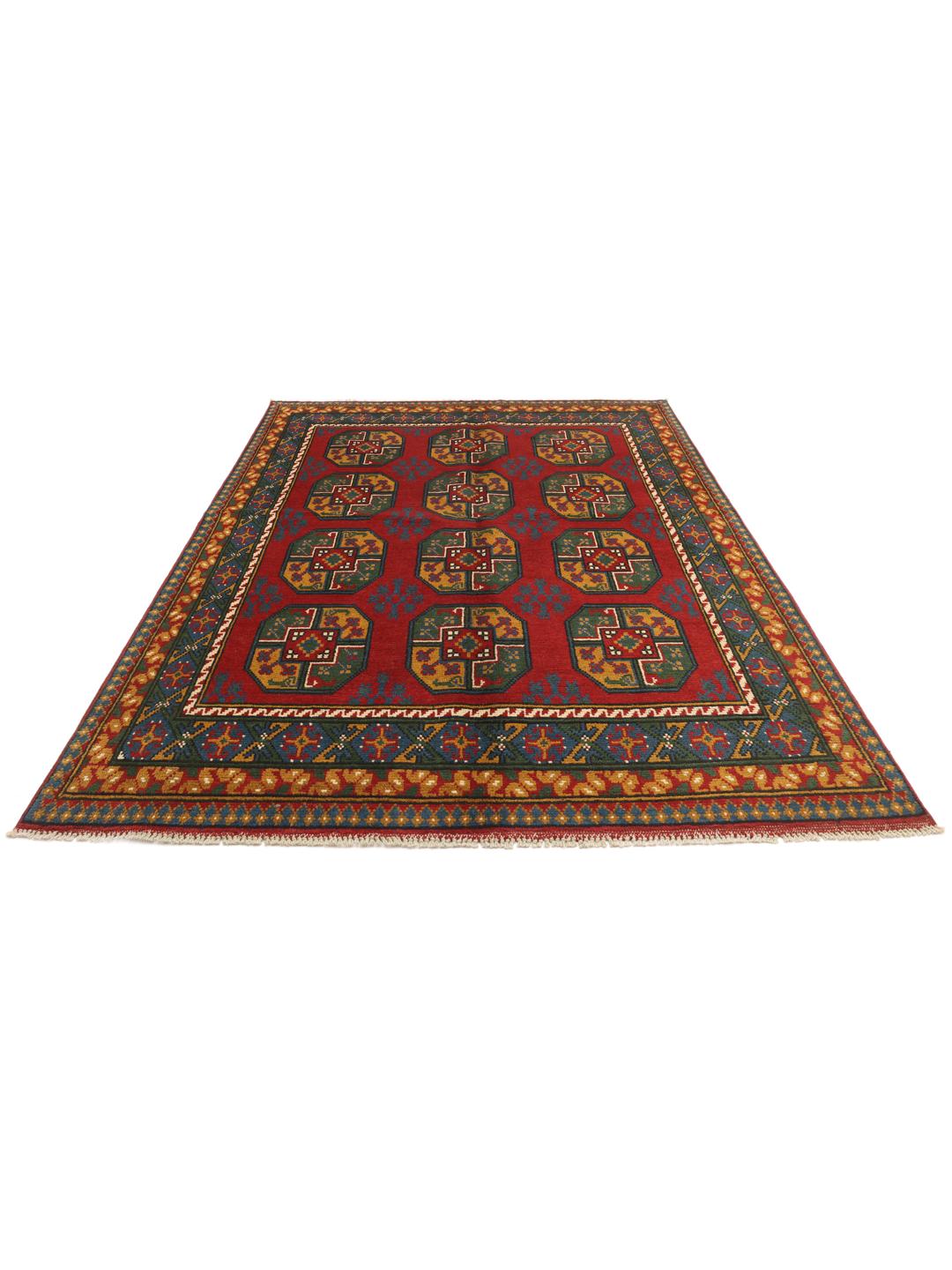 Håndknyttet afghansk tæppe i rødt med traditionelle geometriske motiver