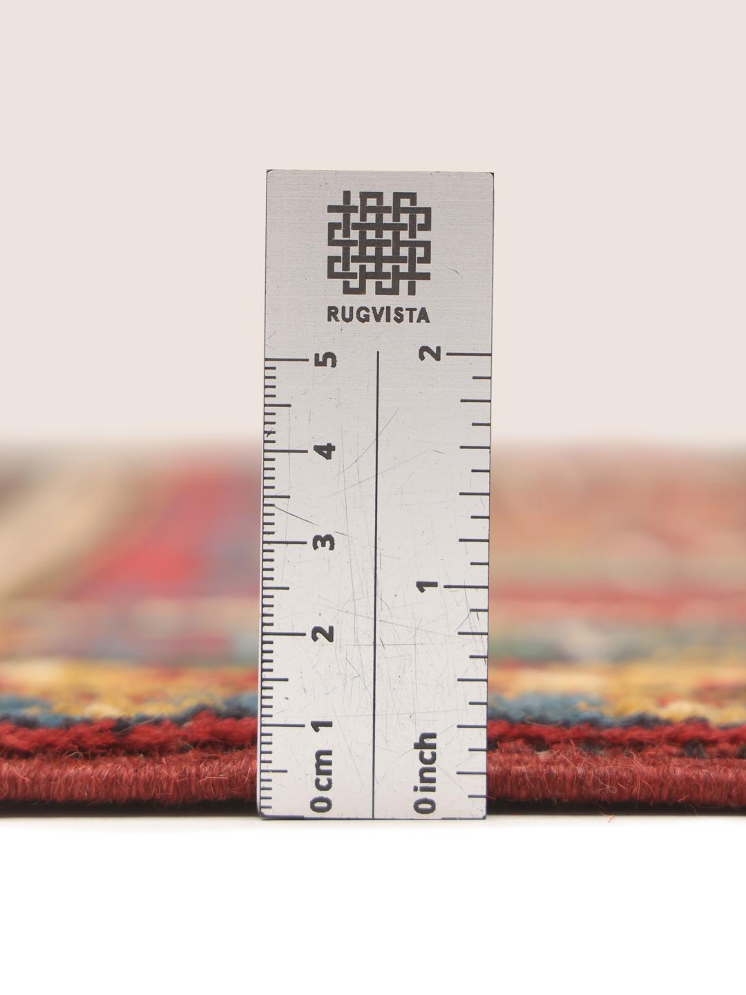 Håndknyttet afghansk tæppe i rødt med traditionelle geometriske motiver