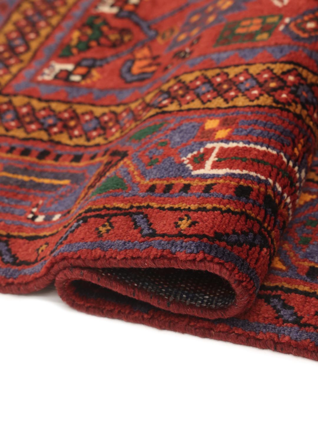 Handgeknoopt Zanjan-tapijt uit het Midden-Oosten in donkerrood met geometrische patronen