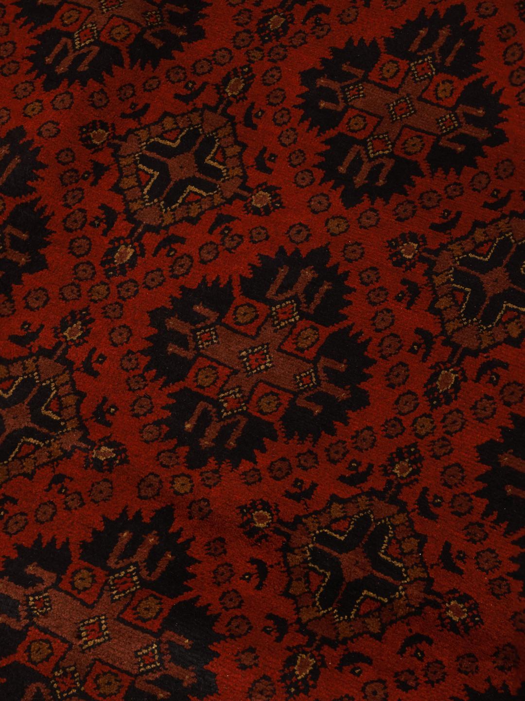 Hand-knotted Afghan Khal Mohammadi wool rug in dark-red with traditional patterns.