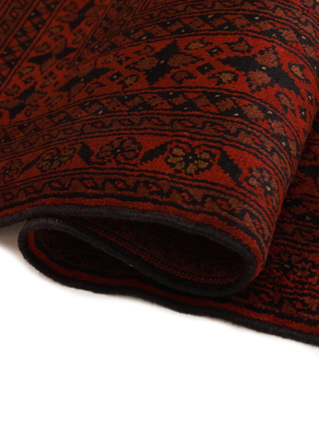 Hand-knotted Afghan Khal Mohammadi wool rug in dark-red with traditional patterns.