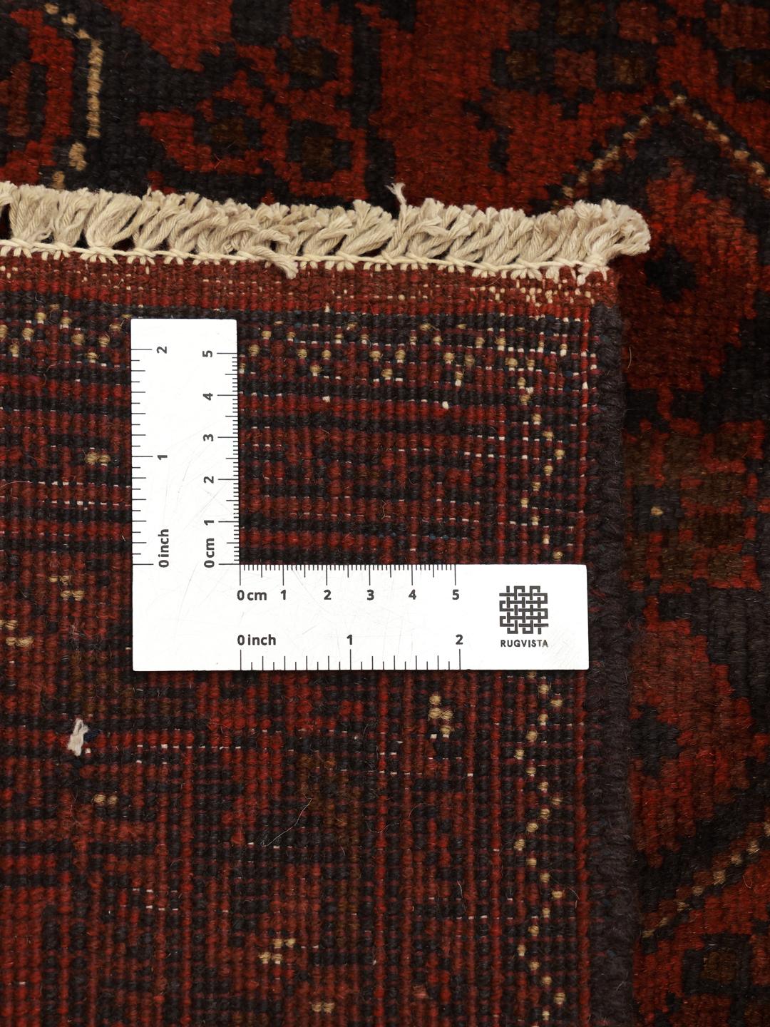 Tapis Afghan Khal Mohammadi noué à la main dans des tons rouge profond