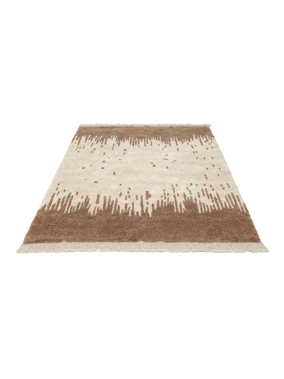 Beige en wit tapijt met organisch patroon en franjes