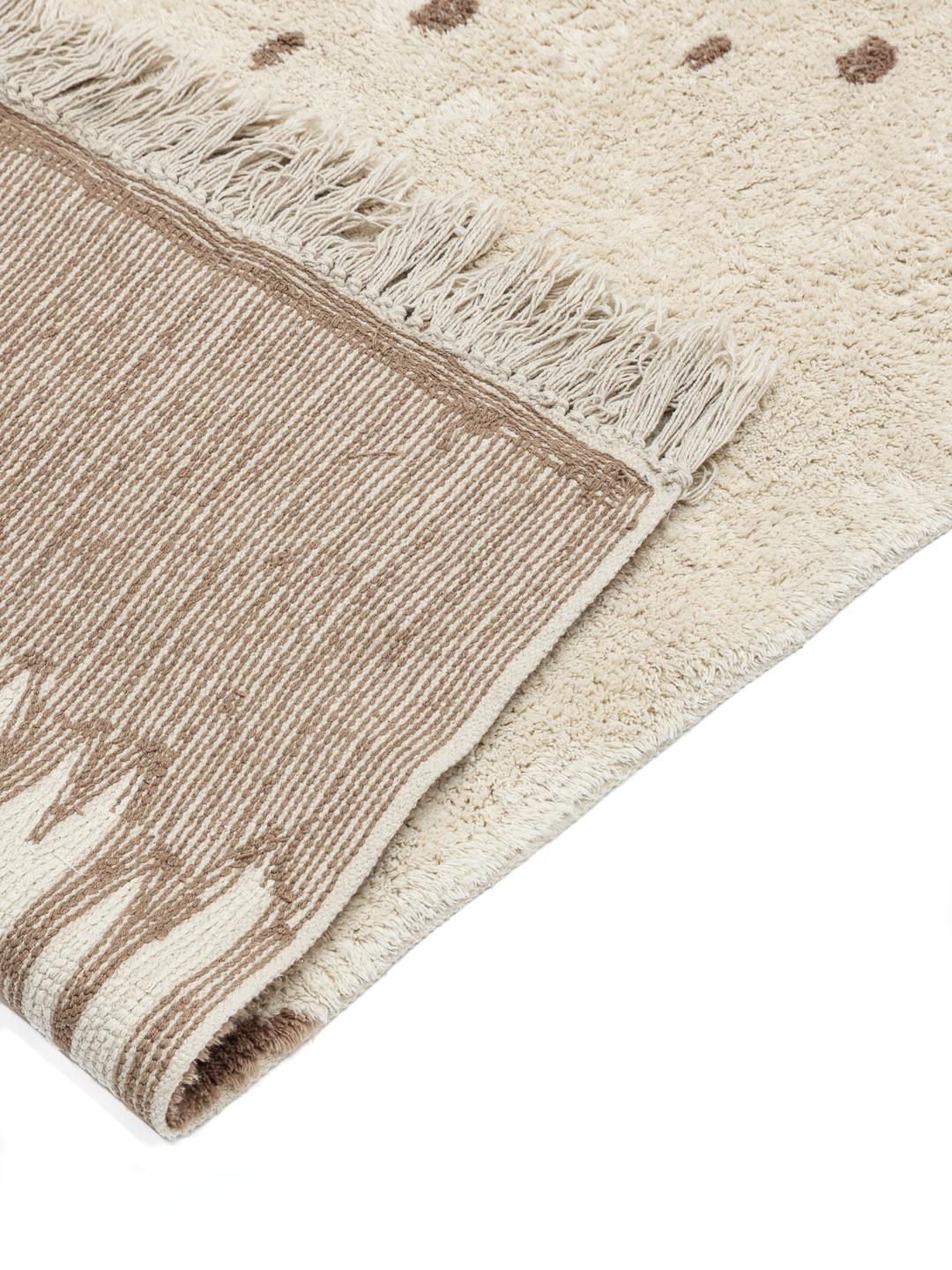 Beige en wit tapijt met organisch patroon en franjes