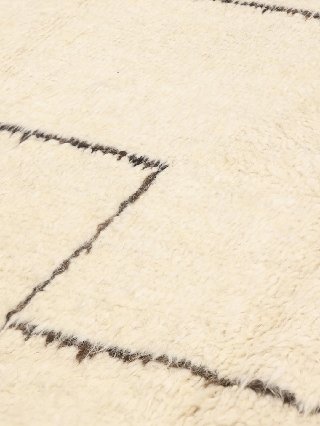Hand-knotted Berber style rug from Afghanistan in beige with geometric lines