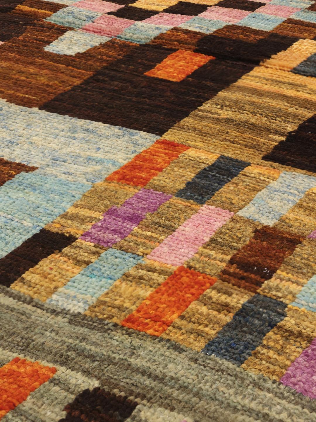 Hand-knotted Afghan Berber rug with a vibrant multicolor geometric design