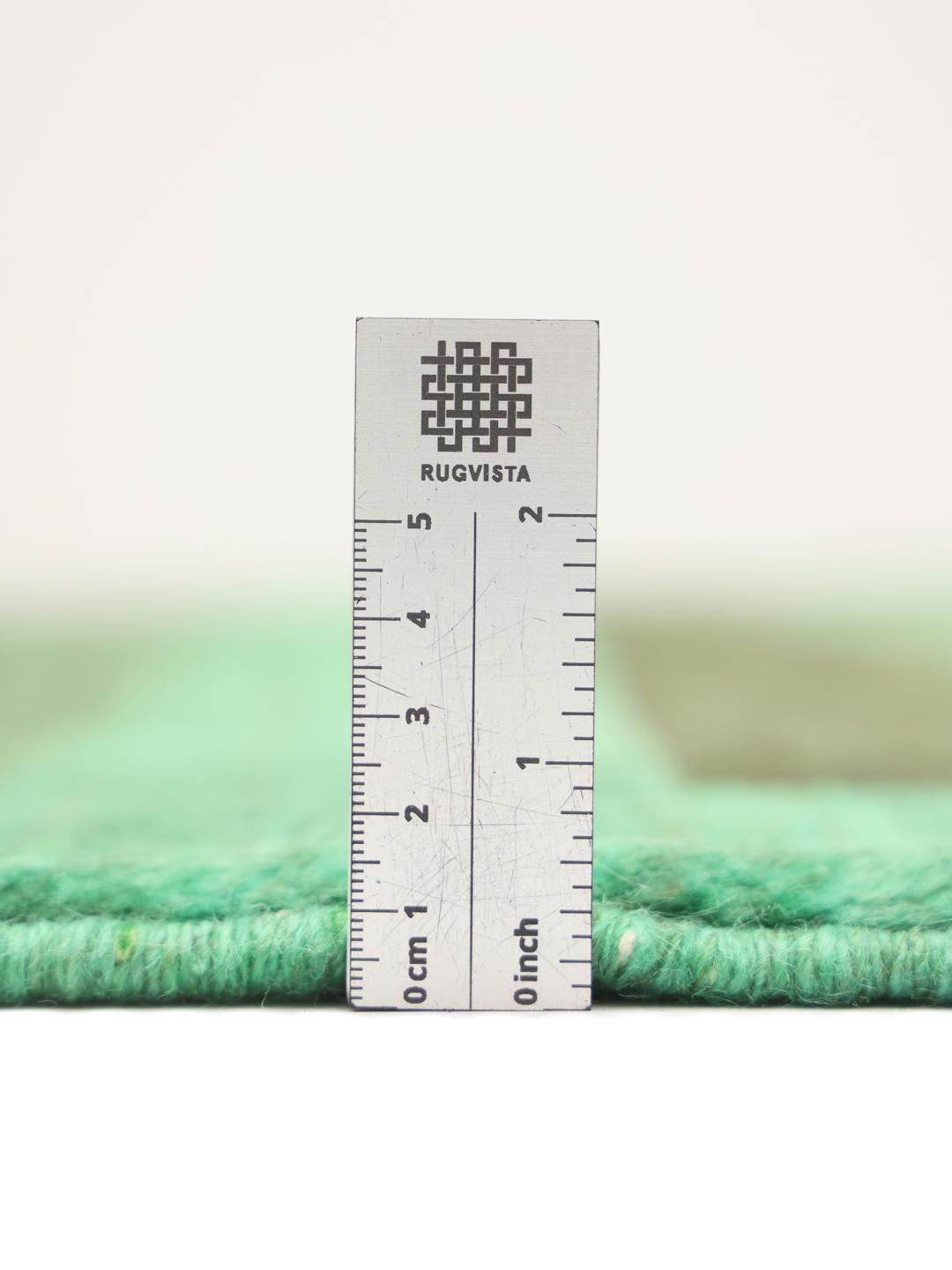 Hand-knotted Gabbeh Fine rug from the Middle East in green