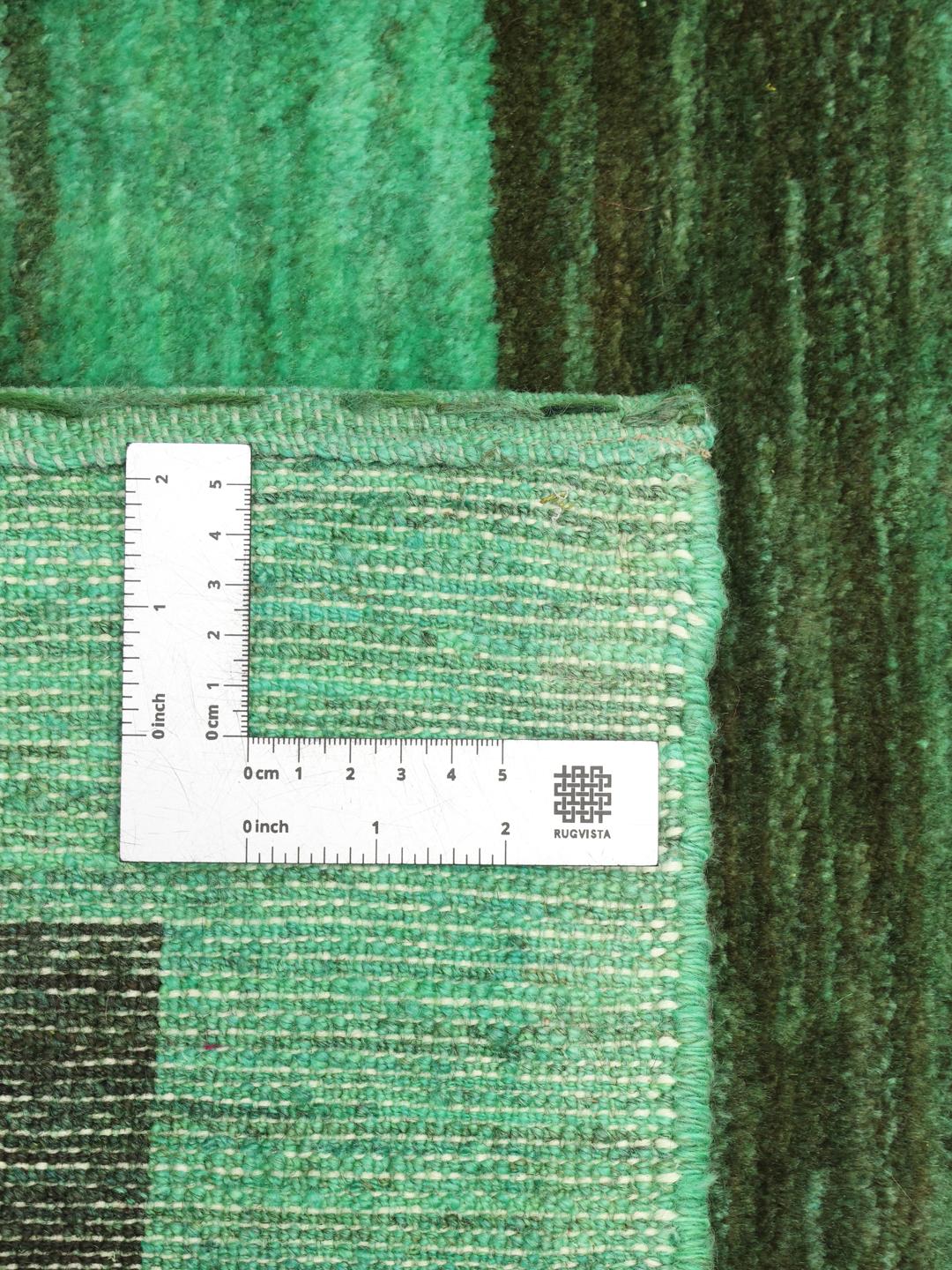 Hand-knotted Gabbeh Fine rug from the Middle East in green