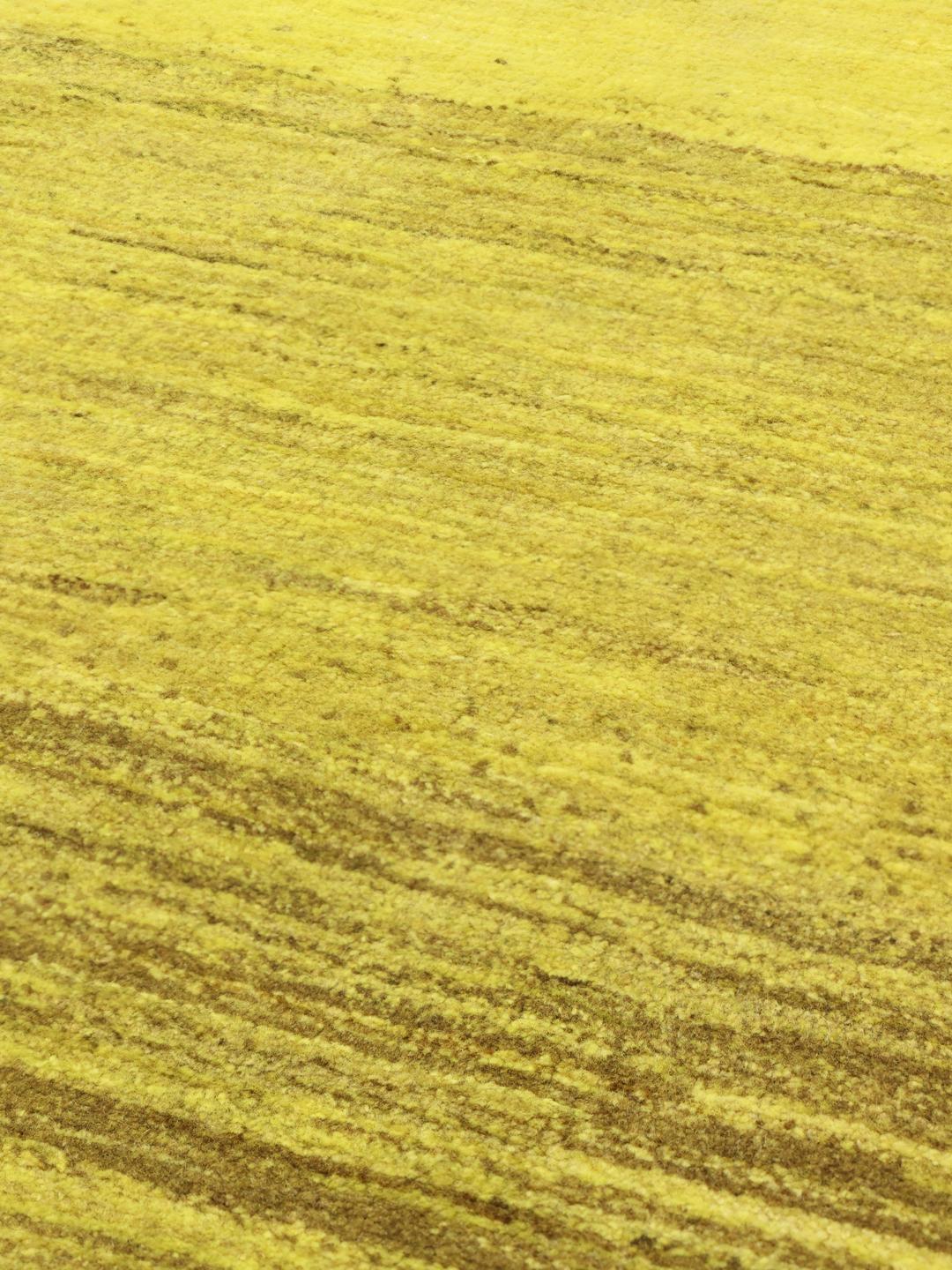 Hand-knotted yellow Gabbeh rug from the Middle East with a soft wool pile