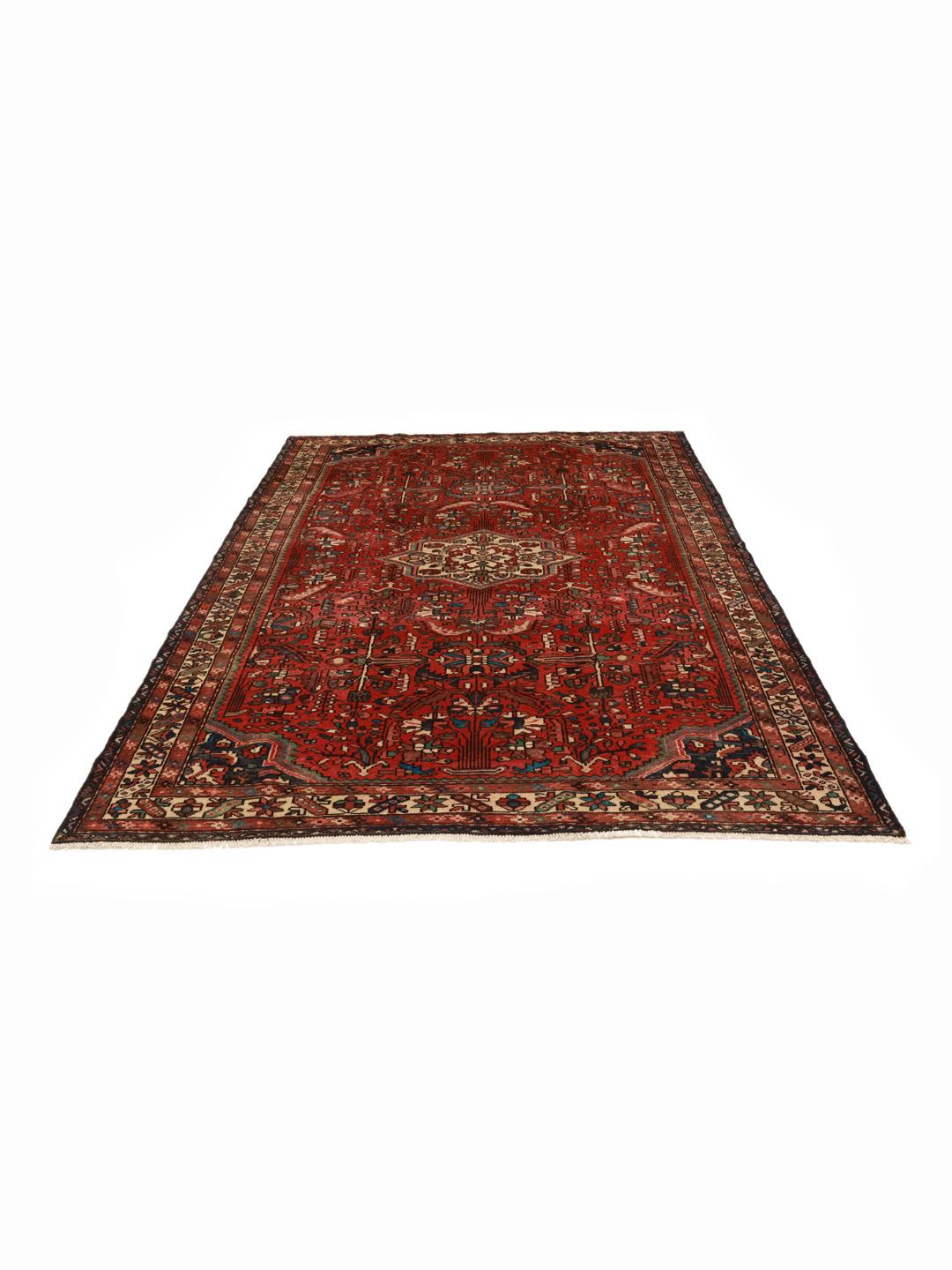 Hand-knotted Hamadan rug from the Middle East in dark-red