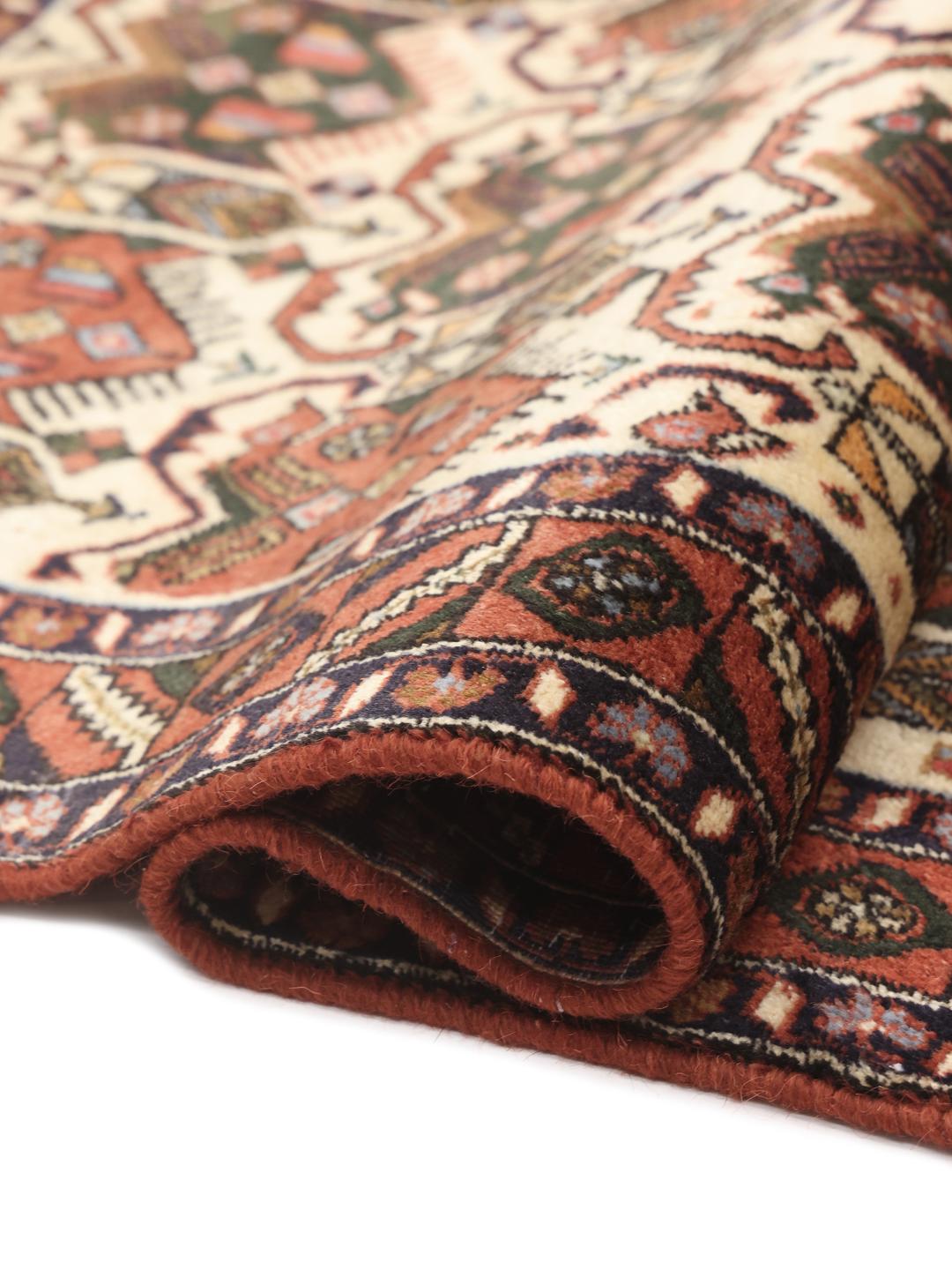 Hand-knotted Afshar Shahre Babak rug from the Middle East in shades of red and beige