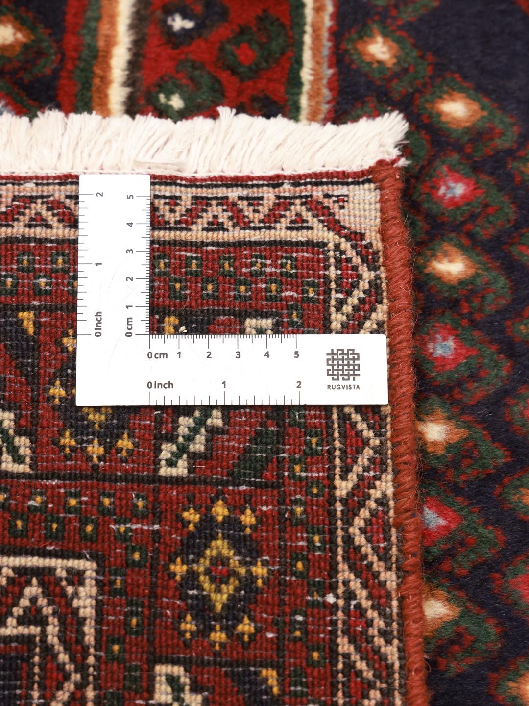 Hand-knotted Afshar Shahre Babak rug from the Middle East featuring a dark-red and black geometric pattern.