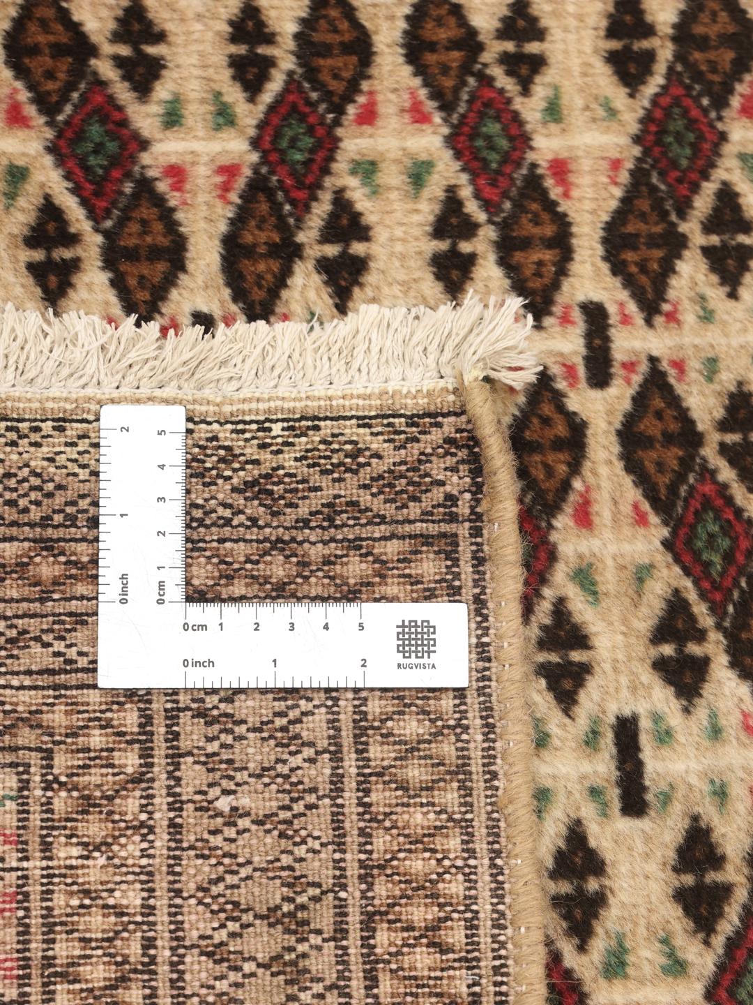 Håndknyttet Turkaman uldtæppe fra Mellemøsten i brune og beige nuancer.