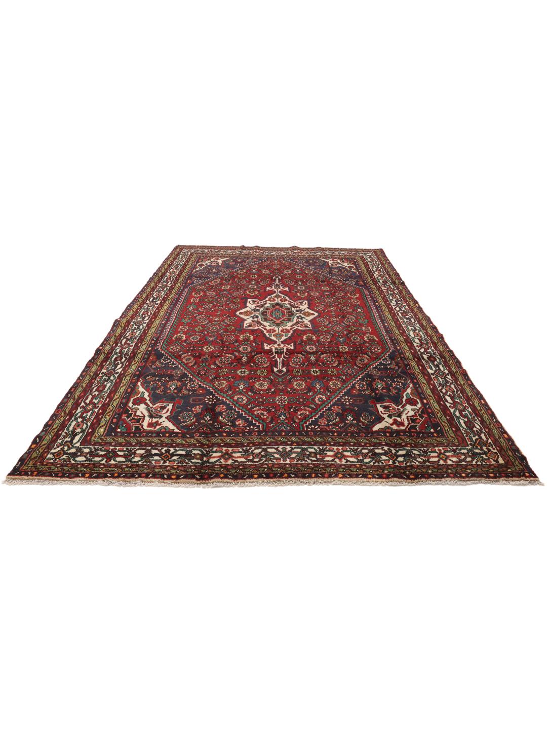 Hand-knotted Hosseinabad rug from the Middle East in deep red and blue tones