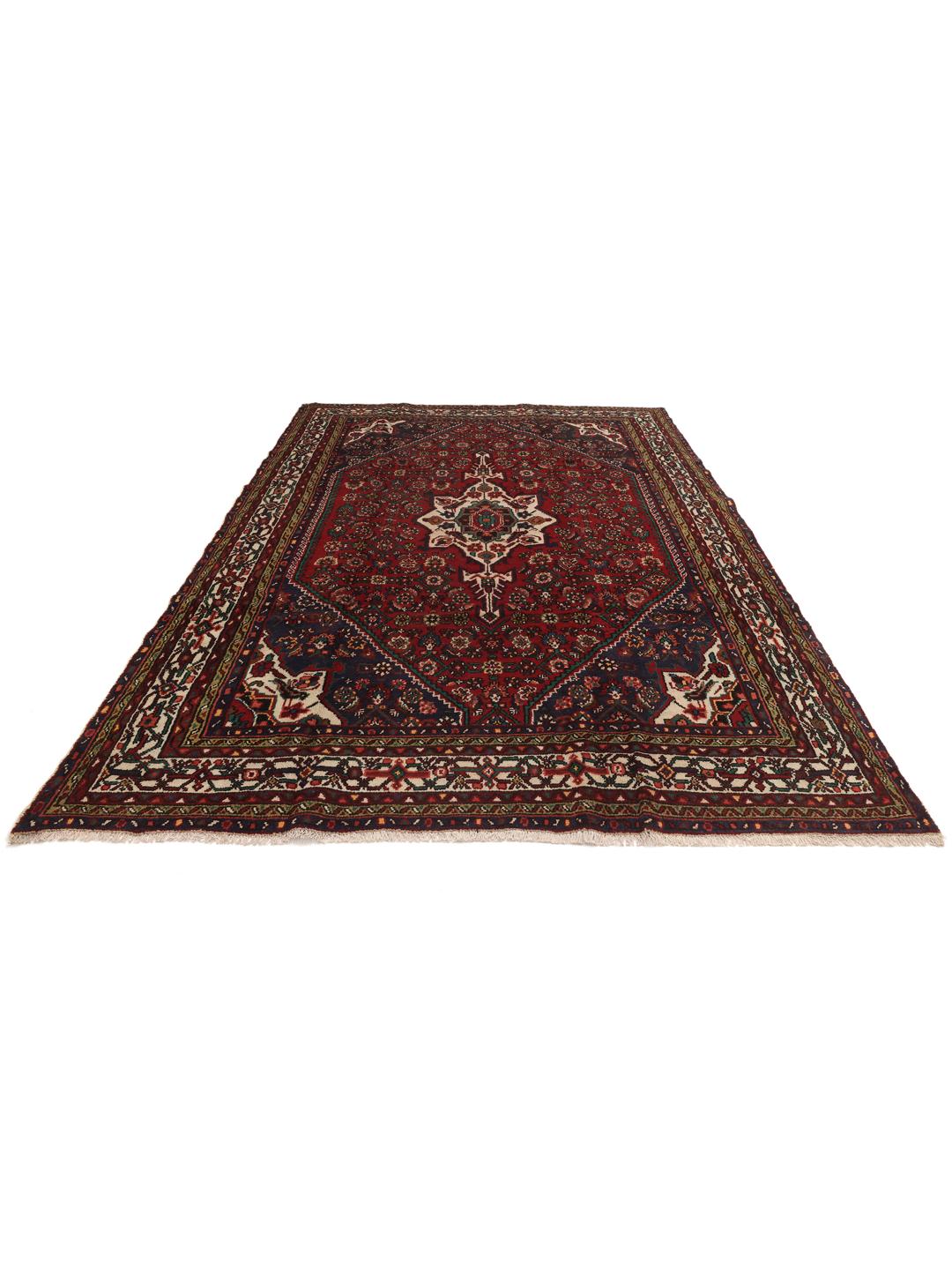 Hand-knotted Hosseinabad rug from the Middle East in deep red and blue tones