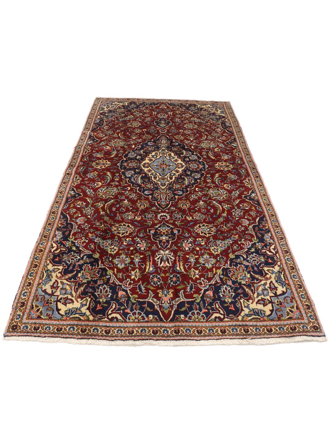 Handgeknoopt Keshan-tapijt met een donkerrood en blauw bloemendessin