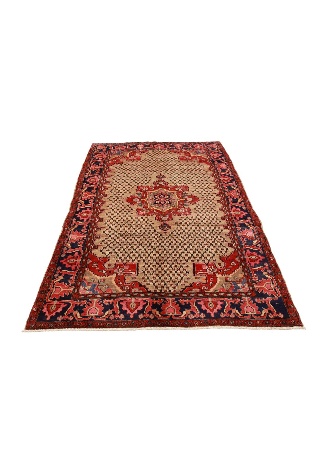 A hand-knotted Koliai rug from the Middle East with a multicolor geometric design.