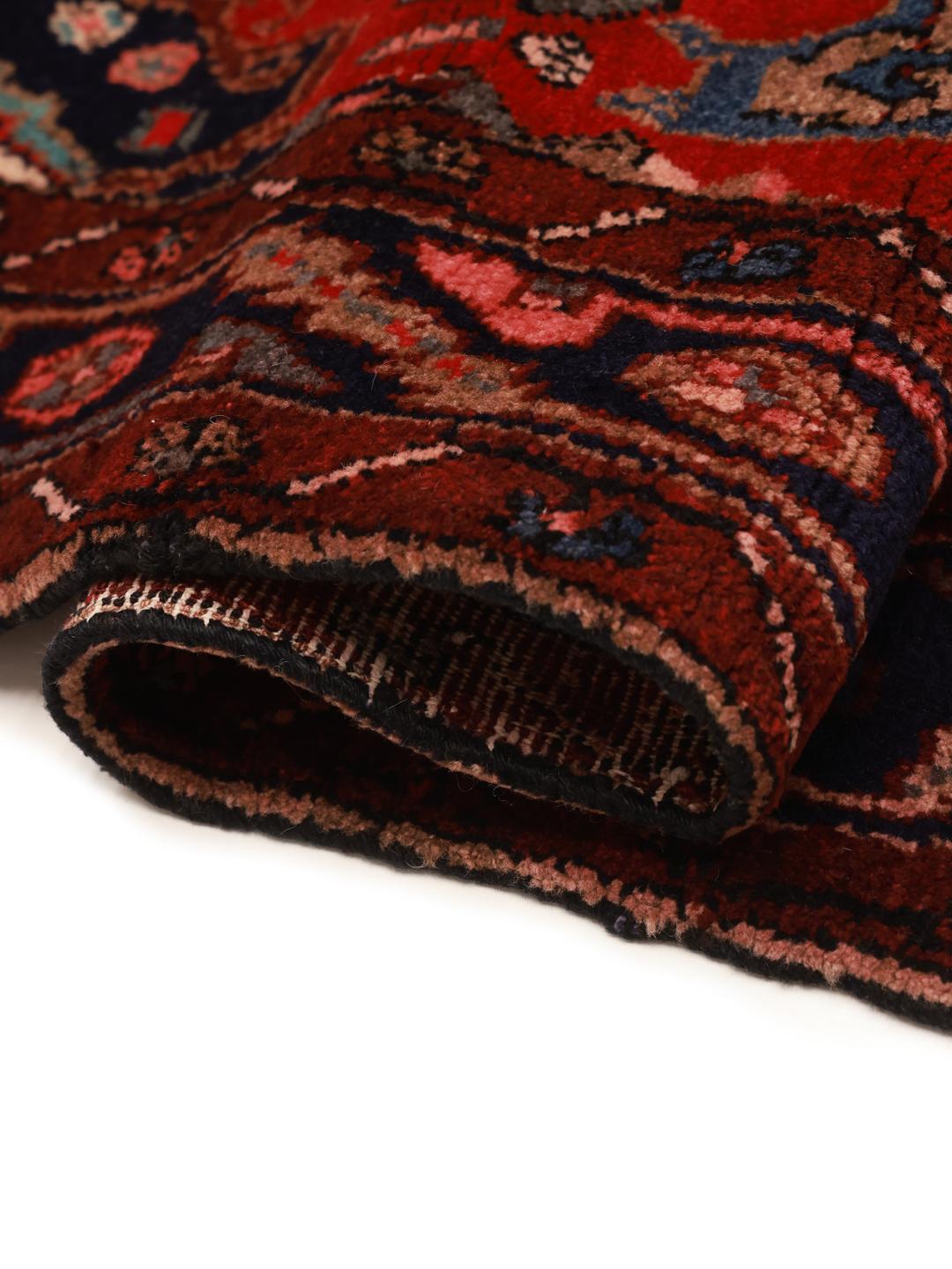 Hand-knotted Middle Eastern Koliai rug in shades of brown and red