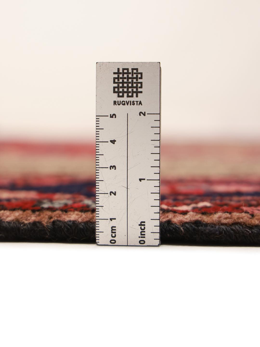 Hand-knotted Middle Eastern Koliai rug in shades of brown and red