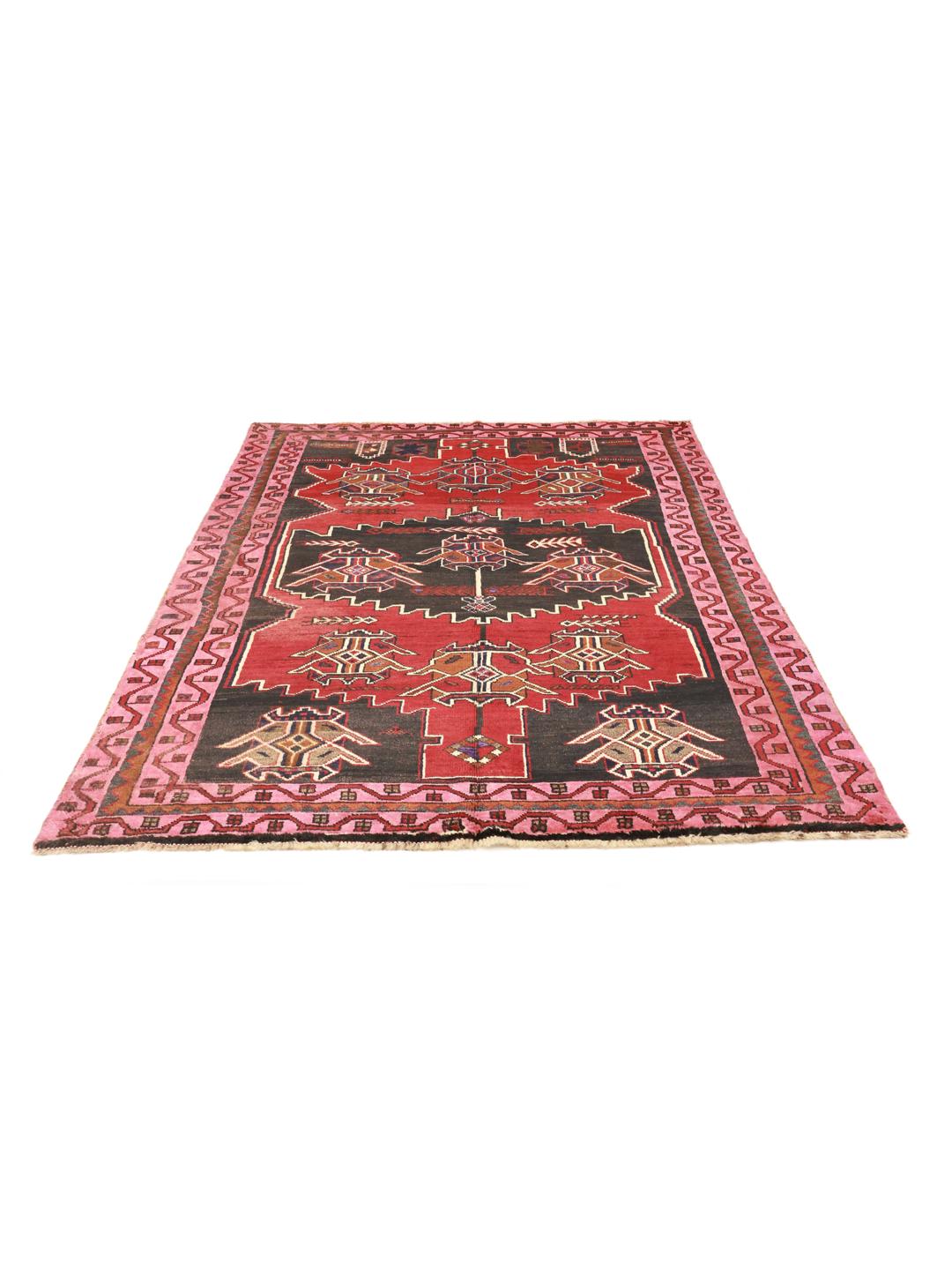 Een uniek Zanjan-tapijt uit het Midden-Oosten met gedurfde rode en zwarte geometrische patronen.