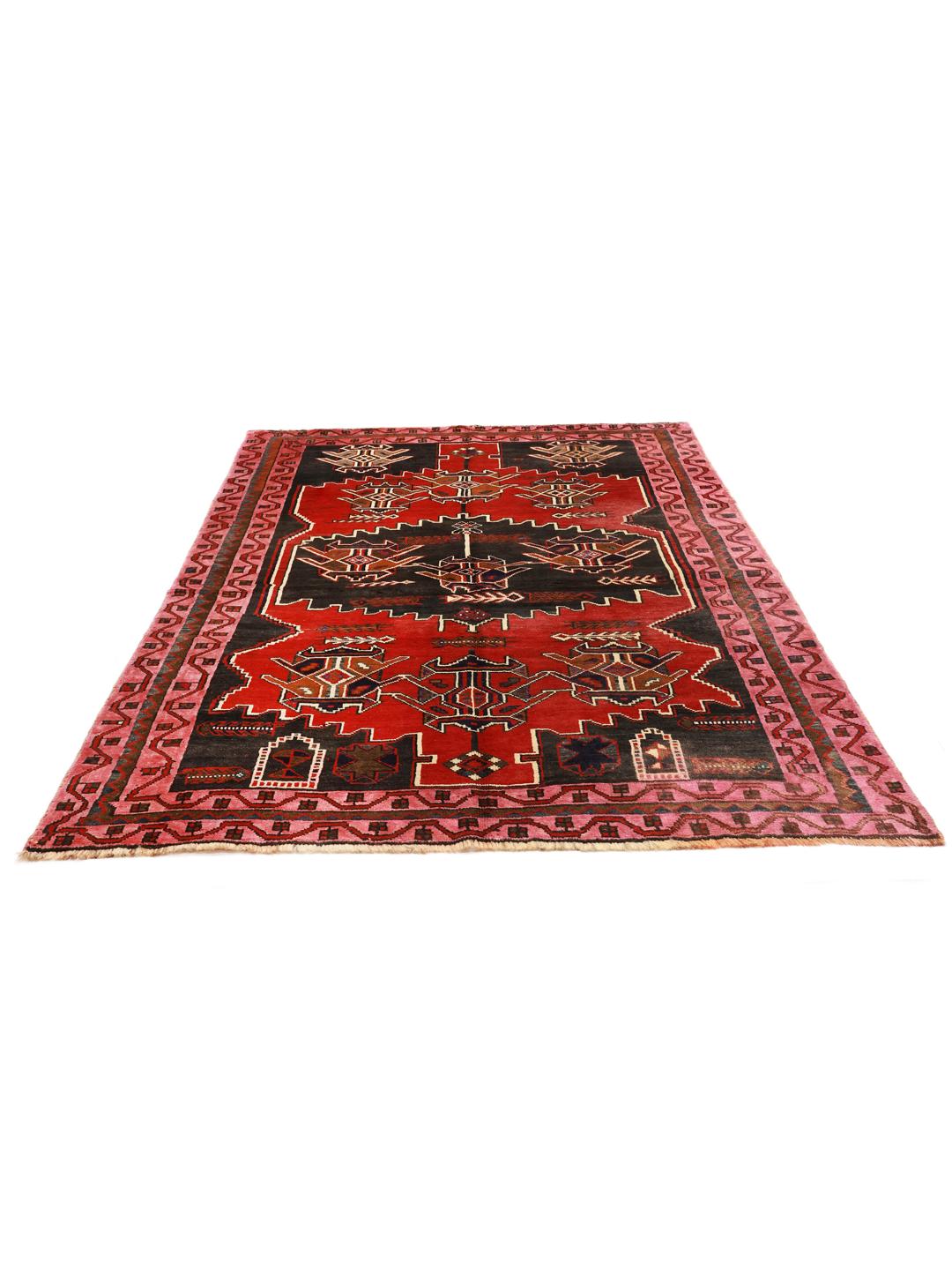 Een uniek Zanjan-tapijt uit het Midden-Oosten met gedurfde rode en zwarte geometrische patronen.