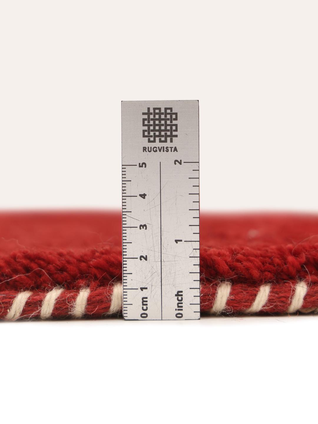 Hand-knotted Gabbeh Fine rug from the Middle East in red and beige tones