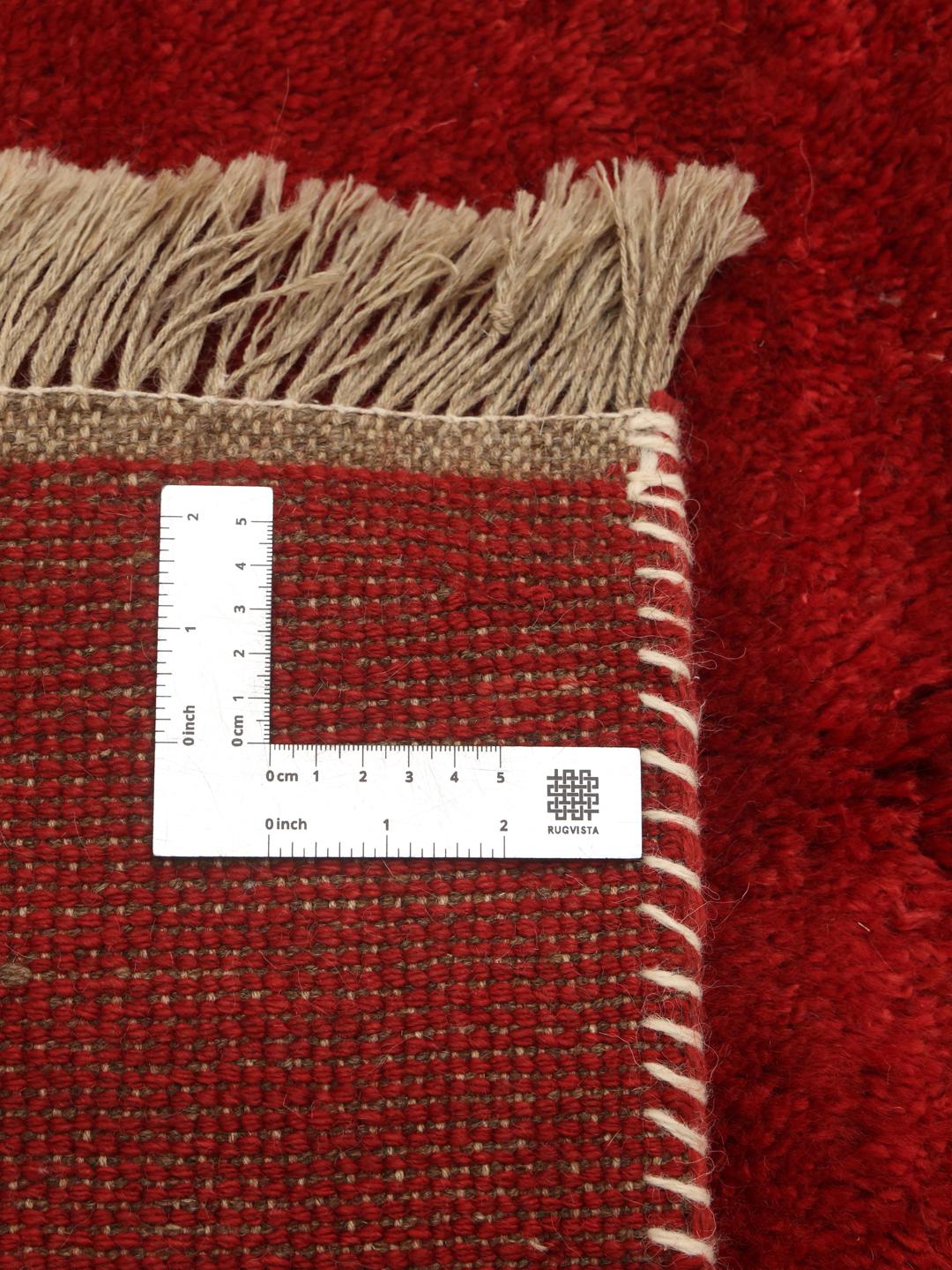 Hand-knotted Gabbeh Fine rug from the Middle East in red and beige tones