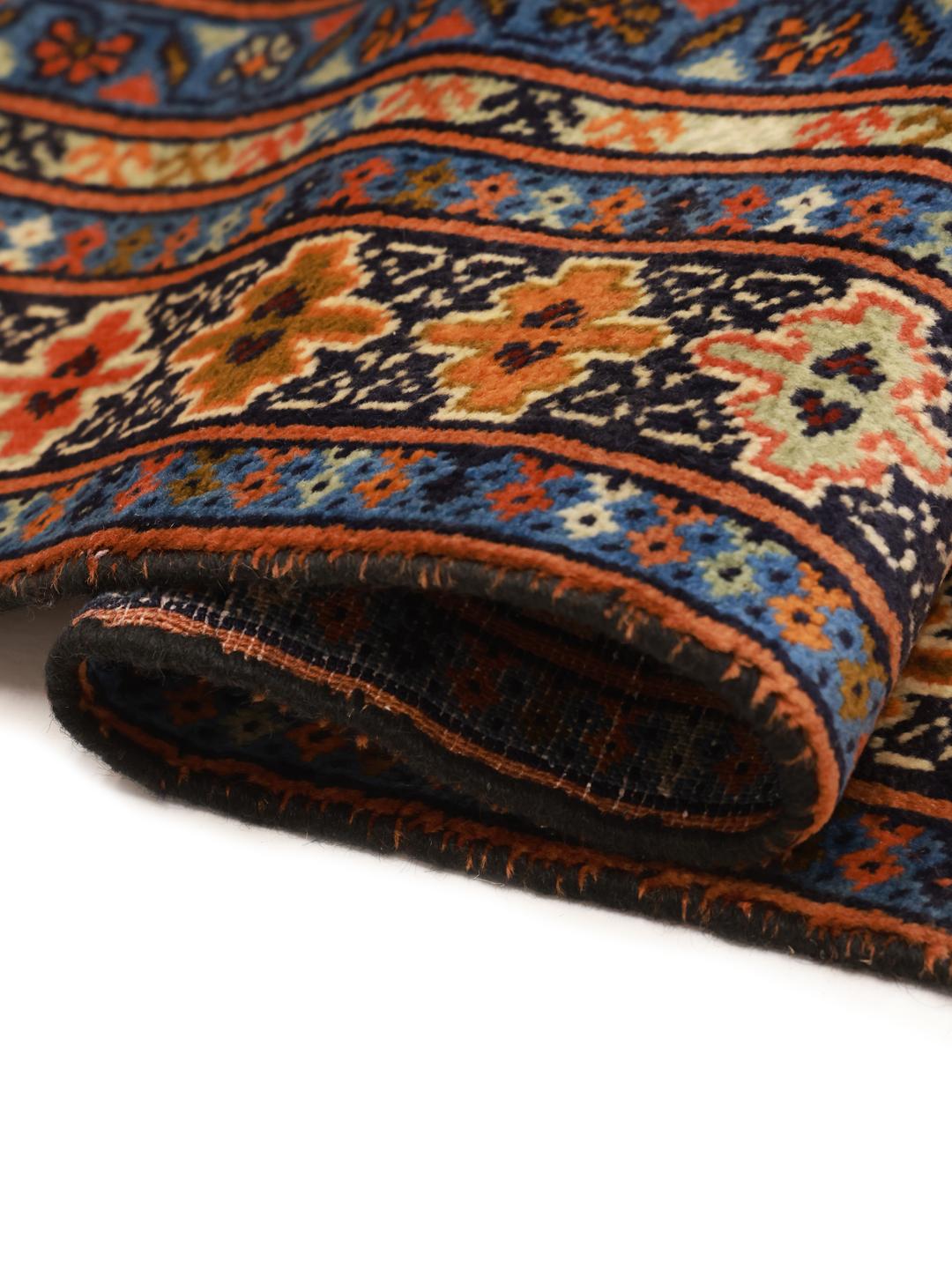 Hand-knotted Middle Eastern Turkaman rug in brown with geometric medallions