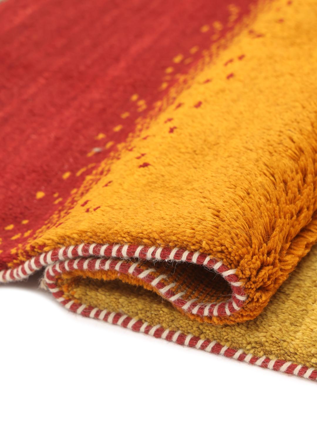 Hand-knotted Gabbeh Fine rug from the Middle East in vibrant red and orange tones