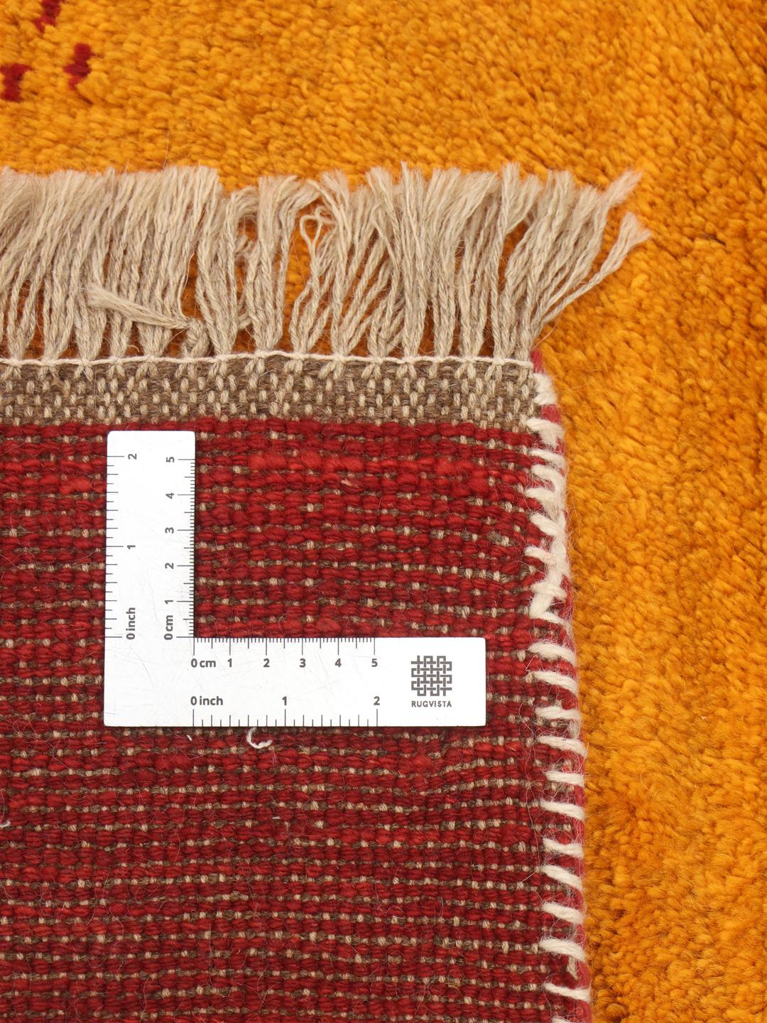 Hand-knotted Gabbeh Fine rug from the Middle East in vibrant red and orange tones