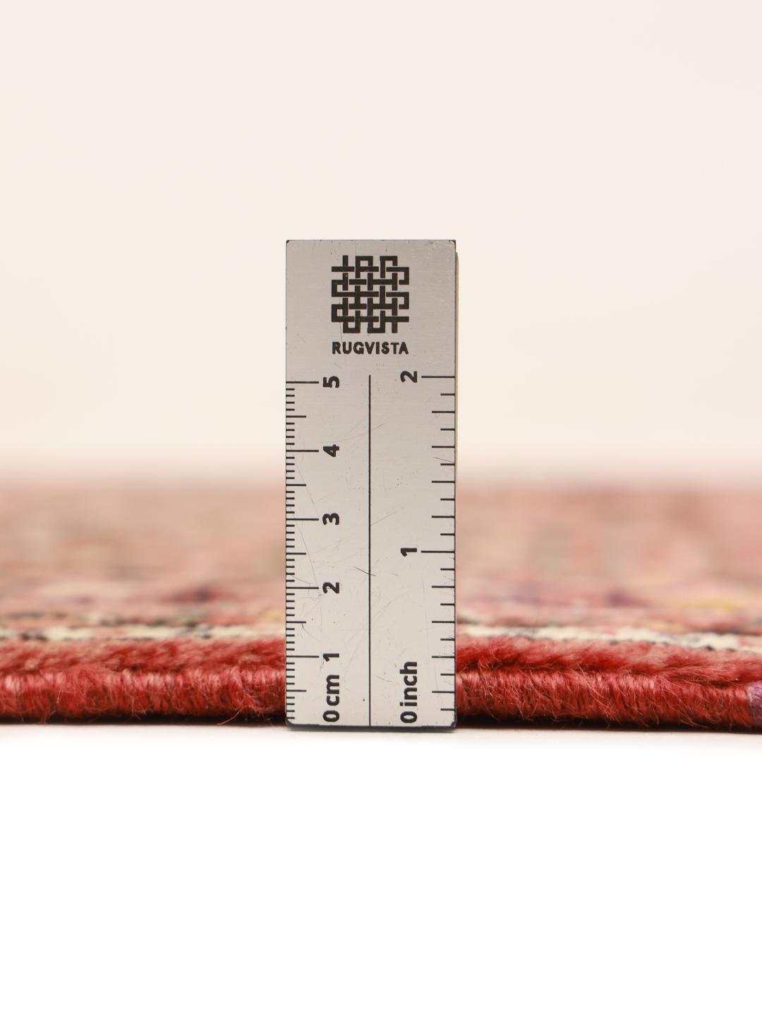 Hand-knotted Hosseinabad runner from the Middle East in deep red tones