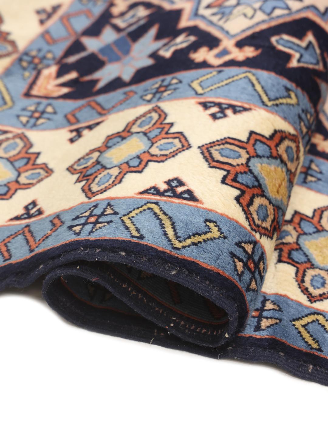 Hand-knotted Heriz rug from the Middle East in multicolor geometric design