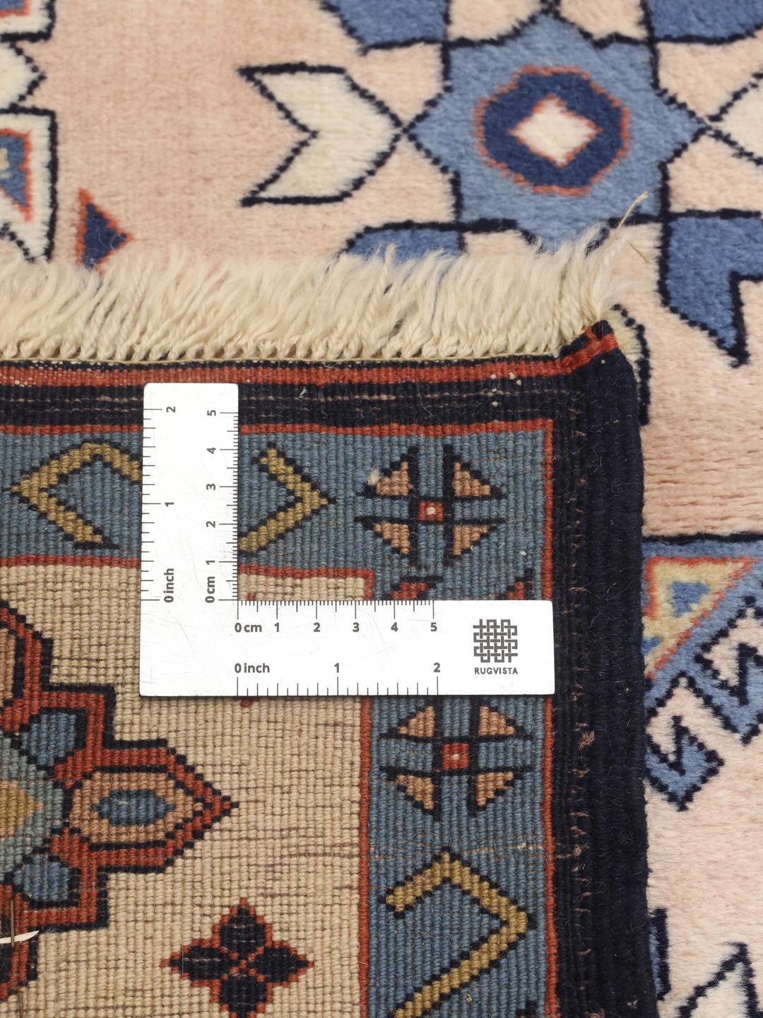 Hand-knotted Heriz rug from the Middle East in multicolor geometric design