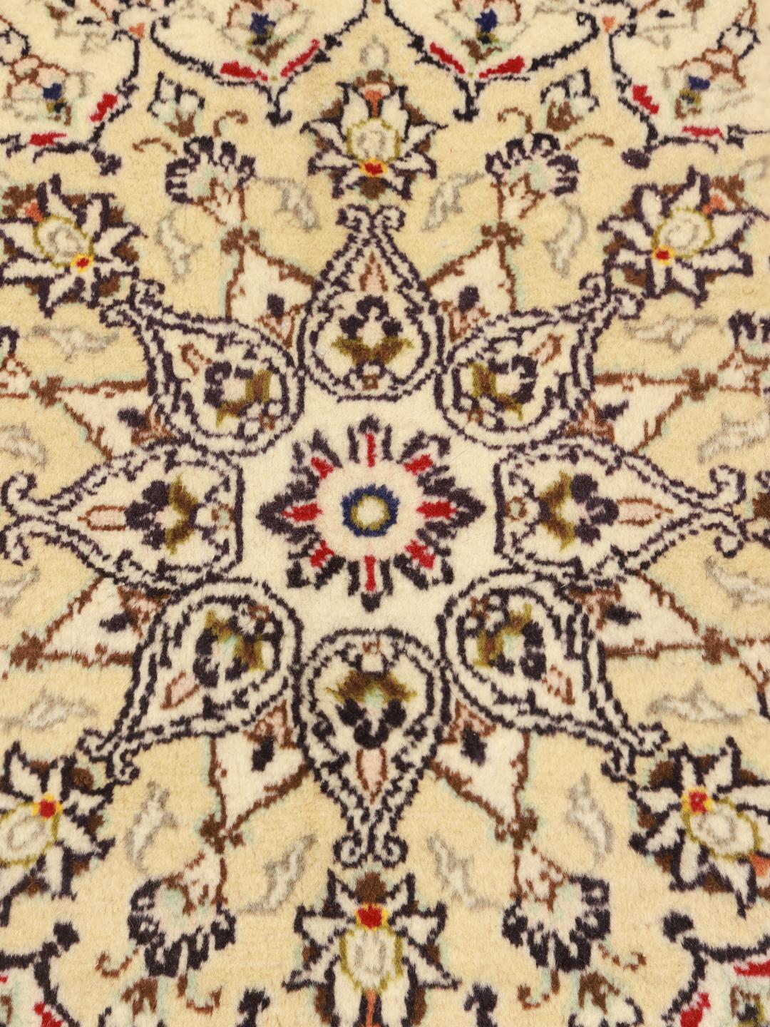 Hand-knotted Keshan rug from the Middle East in beige with intricate floral motifs